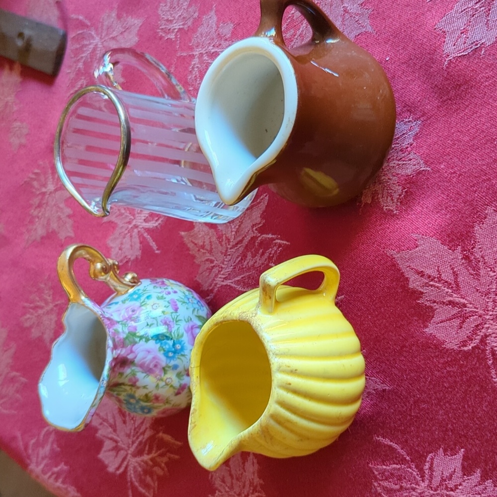 Four little creamers. Vintage